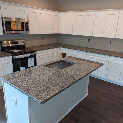 https___cms.countertop.agency_uploads_new_caledonia_kitchen_counters_c3d1550626